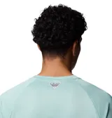 Remera deportiva de manga larga Columbia Terminal Tackle, color verde menta, con tecnología Omni-Shade y Omni-Wick. Presenta mangas raglán y logo de la marca estampado en el pecho y en la manga izquierda.
