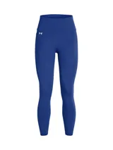 Calza deportiva Under Armour de tiro alto, color azul, con cintura ancha y bolsillo lateral. Confeccionada en tejido de doble punto elástico con tecnología de absorción de sudor.