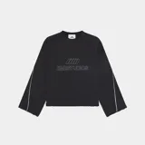 Buzo oversize de algodón color negro con cuello redondo. Presenta el logo de la marca bordado en el frente, líneas blancas en contraste a lo largo de las mangas y terminaciones con bordes deshilachados.