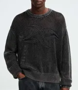 Suéter de punto texturizado color gris oscuro, con cuello redondo, mangas largas y detalle jacquard localizado en el pecho. Confeccionado en algodón.