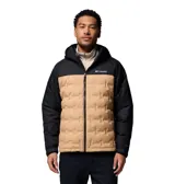 Campera puffer Columbia modelo Grand Trek III, de diseño bicolor con cuerpo en color tostado y mangas y capucha en negro. Cuenta con cierre frontal y bolsillos con cremallera.