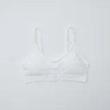 Pack de dos tops tipo bralette de tejido acanalado, uno en color blanco y otro en color negro, con breteles finos regulables.