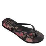 Sandalias tipo ojotas Havaianas modelo Slim Organic, con base blanca estampada con flores en tonos marrones y rosados, y tiras finas en color dorado.