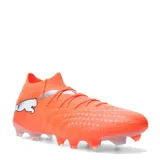 Championes de fútbol Puma Future 9 Match para terreno firme y artificial, en color naranja vibrante con detalles en blanco. Presentan una construcción de corte medio con tecnología de ajuste y suela con tapones diseñados para tracción óptima.