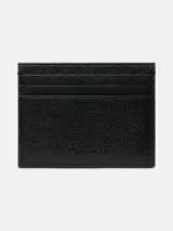 Tarjetero plano de piel granulada negra con seis ranuras para tarjetas y una ranura central. Presenta protección RFID y el logo de Calvin Klein grabado en la parte delantera.