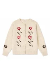 Cardigan de punto color beige con cierre frontal de botones y diseño estampado de flores en tonos rojos y marrones.