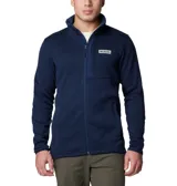 Buzo polar Columbia de tejido tipo sweater, color azul marino, con cierre frontal completo, cuello alto y bolsillo con cierre en el pecho. Cuenta con refuerzos en la zona del pecho y logo de la marca aplicado.