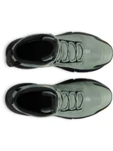 Botas tácticas Under Armour modelo Charged Valsetz Mid, color verde oliva con suela negra. Presentan parte superior sintética transpirable con refuerzos de poliuretano, entresuela Charged Cushioning para mayor amortiguación y suela exterior Vibram XS Trek de alta tracción.