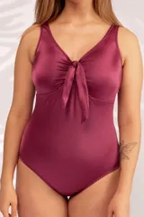 Malla entera color borgoña con breteles finos y escote en V con nudo.