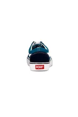 Championes deportivos Pony modelo Garden, color azul marino con el característico logo lateral en blanco y cordones blancos. Suela de goma blanca con línea negra.