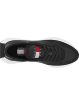 Zapatillas deportivas Tommy Jeans de corte bajo, con exterior de poliéster y diseño de paneles con mezcla de texturas. Presentan suela dentada de goma y caucho, cierre con cordones y parche distintivo de la marca en la lengüeta.