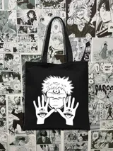 Tote bag negra de algodón con asas negras y estampado blanco de Sukuna, personaje del anime Jujutsu Kaisen, con manos con ojos en las palmas.