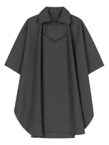 Poncho impermeable negro de neopreno con interior de polar.