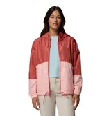Campera cortavientos Columbia de mujer, bicolor en tonos rojo y rosado, con capucha ajustable, cierre frontal y bolsillos con cremallera.