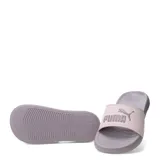 Sandalias tipo ojota Puma modelo Popcat 20, con base y suela en color lila y banda superior en color rosado con el logo de la marca en relieve.