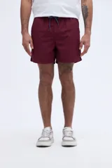 Short de baño liso azul marino, de corte clásico con cintura elástica y cordón ajustable.