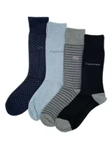 Pack de 4 pares de medias largas de vestir Calvin Klein, con diferentes diseños: azul marino con lunares, celeste liso, gris a rayas horizontales y negro liso.
