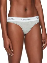 Colaless de tiro medio confeccionada en mezcla de algodón modal, color gris melange, con cintura elástica distintiva con logo de Calvin Klein.
