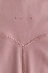 Leggings deportivas de tiro alto con cintura ancha, confeccionadas en tejido funcional con tecnología SoftMove para mayor suavidad y DryMove para absorción de humedad.