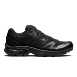 Championes Salomon modelo XT-6 de color negro, diseñados para trail running y uso urbano, con sistema de ajuste rápido Quicklace y suela con gran tracción.