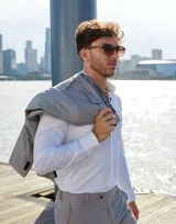 Gafas de sol unisex Hawkers X Pierre Gasly, con montura redonda carey y lentes marrones degradadas.