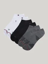 Pack de tres pares de medias tobilleras Tommy Hilfiger en blanco, negro y gris. Cada par presenta el logo de la marca bordado en el tobillo y detalles distintivos en la puntera y el talón.