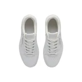 Championes Reebok Match Prime V2 de diseño clásico y minimalista, color blanco, con suela de goma y detalles de costuras visibles.