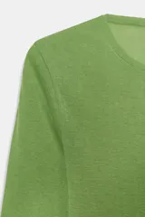 Camiseta de corte cropped y ajuste slim, confeccionada en algodón Supima. Presenta cuello redondo y manga larga con bajo recto.