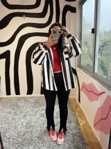 Calza negra de morley con cierres de 15 cm en el bajo, para usar como semi Oxford o abierta.