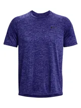 Remera deportiva Under Armour de manga corta, confeccionada en tejido técnico liviano con efecto jaspeado. Presenta cuello redondo y logo de la marca estampado en el pecho.