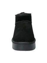 Bota corta de estilo casual, confeccionada en cuero negro con interior forrado en poliéster. Presenta una suela de plataforma de goma negra y un diseño minimalista de caña baja.