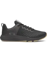 Championes de entrenamiento Under Armour modelo Charged Engage 2, color negro con suela de goma en tono arena. Presentan parte superior transpirable con estampado 3D, refuerzos de TPU en el talón y entresuela Charged Cushioning para mayor amortiguación y respuesta.