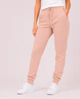 Pantalón tipo babucha de corte holgado, con cintura elástica ajustable mediante cordón, bolsillos laterales y puños elásticos en los tobillos. Presenta un pequeño logo bordado en la parte superior de la pierna.