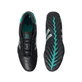 Championes Adidas Adiracer de perfil bajo inspirados en el automovilismo, en color negro con detalles plateados y turquesa. Presentan diseño de tres tiras en los laterales, empeine de cuero con inserciones sintéticas y suela de goma.