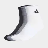 Pack de tres pares de medias soquetes Adidas con amortiguación en la planta del pie. Diseño deportivo con logo de la marca en el tobillo, confeccionadas en tejido suave y resistente.