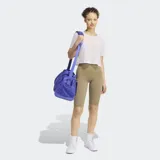 Top deportivo Adidas Optime Workout Twist Reversible de color lila, con diseño de doble tirante y cuello redondo.