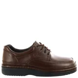 Zapato de vestir acordonado color negro, confeccionado en cuero, con suela de goma robusta y costuras reforzadas.