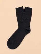 Medias de algodón color negro con estampado de pequeños puntos claros.