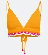 Blusa cropped de lino color naranja, con escote en V, tirantes finos, lazo y elástico en la espalda, y encaje de ganchillo en el ruedo.