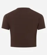 Blusa cropped de Blue Steel, confeccionada en algodón con elastano. Presenta cuello redondo, mangas cortas y un diseño básico ajustado al cuerpo.