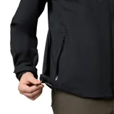 Campera impermeable y transpirable Columbia modelo Earth Explorer II Omni-Tech, de color negro, con capucha ajustable, cierre frontal con solapa, bolsillos con cremallera y puños ajustables.
