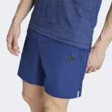 Short deportivo Adidas de entrenamiento, color azul, con ajuste ceñido y cintura elástica. Cuenta con tecnología CLIMACOOL para control de humedad y bolsillos laterales.