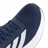 Championes Adidas Response Runner 2, de color azul marino con las tres tiras características de la marca en blanco y suela blanca.