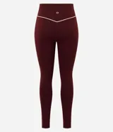 Pantalón legging deportivo Get Over de color bordó, confeccionado en microfibra elastizada con cintura alta y una línea vertical en contraste en el lateral.