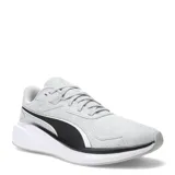 Championes deportivos Puma modelo Skyrocket Lite Elevate, color gris claro con detalles en negro y suela blanca. Presentan un diseño de malla transpirable con el logo de la marca en el lateral y cierre de cordones.