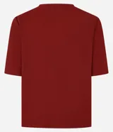 Blusa verde militar de piqué, corte slim, con escote en V y detalle texturizado en la vista delantera. Tiene mangas cortas.