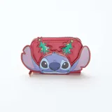 Monedero rojo con diseño temático de Stitch de Disney, decorado con apliques de árboles de Navidad y cierre perimetral con tirador metálico.