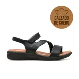 Sandalia casual de cuero negro para mujer, con diseño de tiras cruzadas y ajuste mediante cierre de contacto. Cuenta con plantilla acolchada en tono tostado y suela baja de goma.
