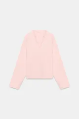 Sudadera de algodón en color rosado, con escote en V y mangas largas de corte holgado.