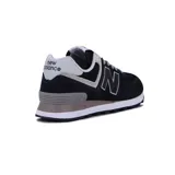 Championes urbanos New Balance modelo 574 Core, color negro con detalles en gris y blanco, confeccionados en gamuza y malla, con logo "N" característico en los laterales y entresuela ENCAP.